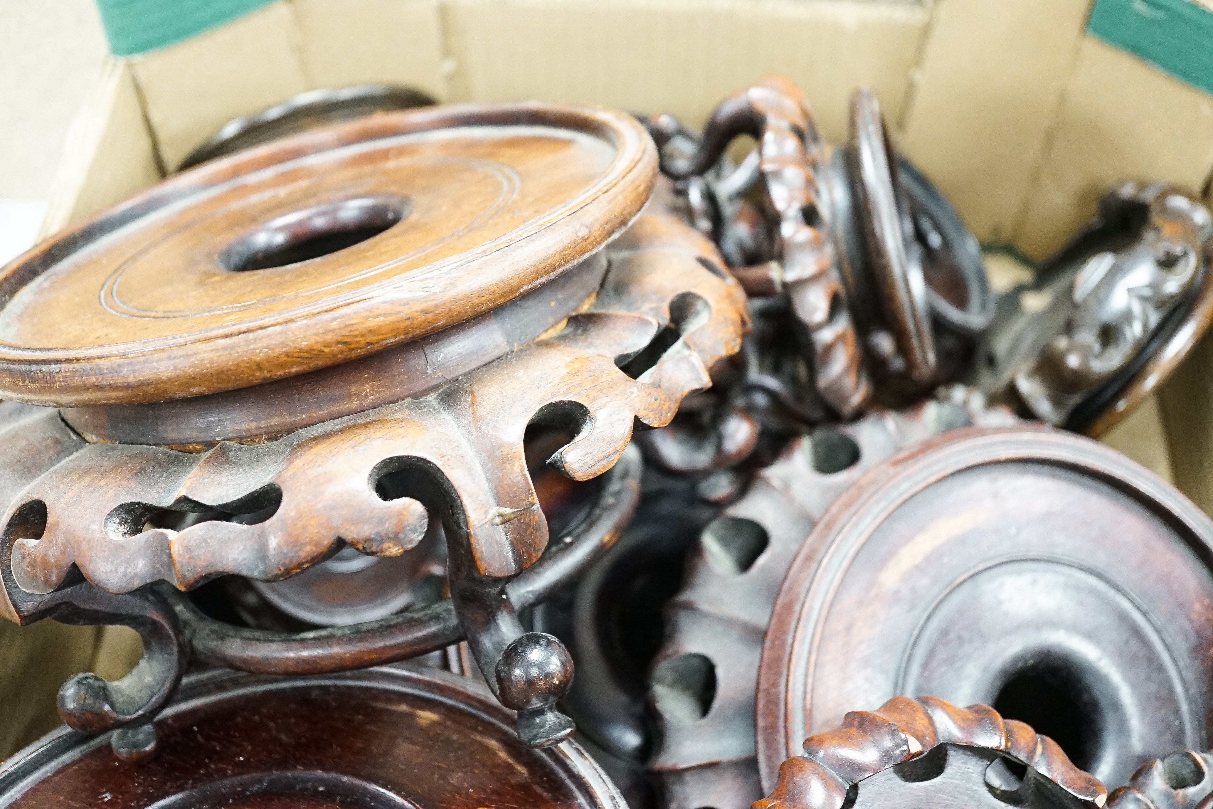 A large collection of Chinese hardwood stands.